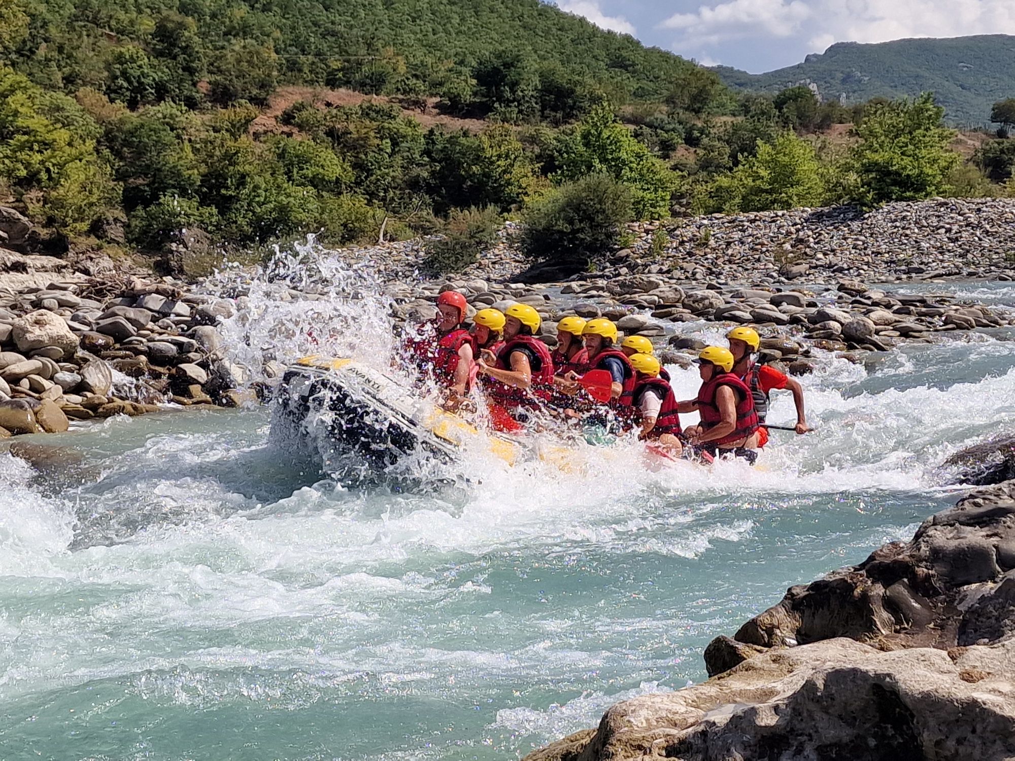 Raft navigating rapids on the Vjosa River in Albania